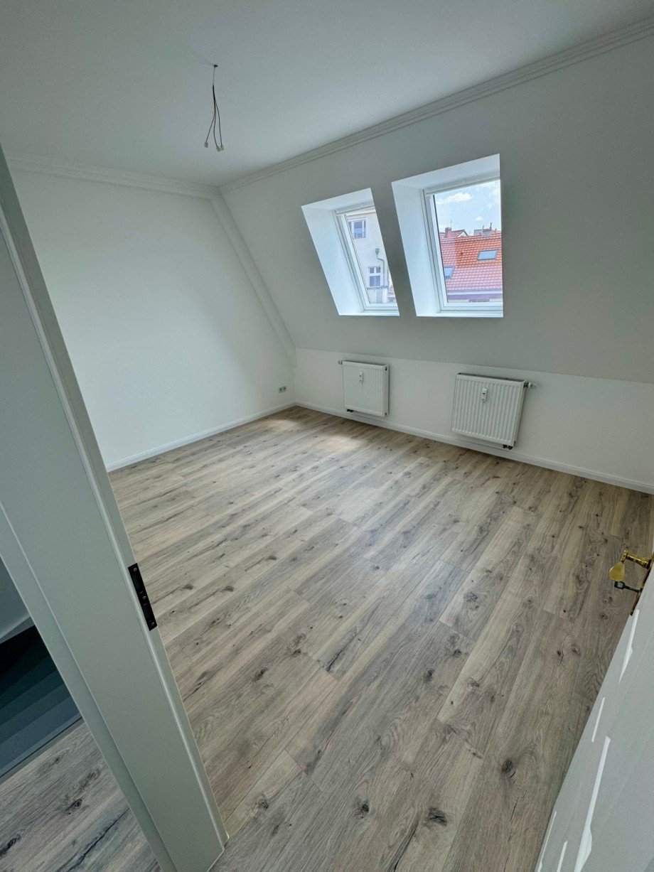 Zimmer 1 5.OG Dachgeschosswohnung Berlin